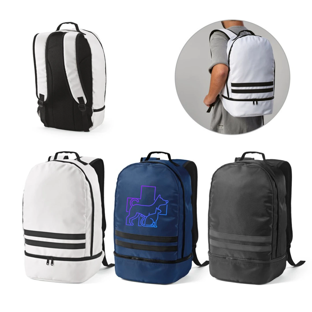 Mochila em Poliéster Reciclado com Refletores - Mochila em poliéster reciclado (100% rPET), totalmente forrada, com costas e alças almofadadas e faixas pretas refletoras na parte frontal. 48 x 30 x 21 cm.
