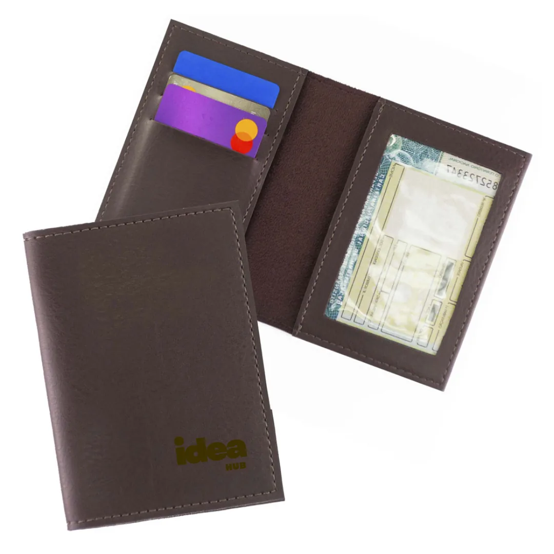 Porta-Documentos com Porta-Cartões - Porta-documento em sintético Biddins, com visor em PVC e porta-cartões. Gravação em baixo-relevo.